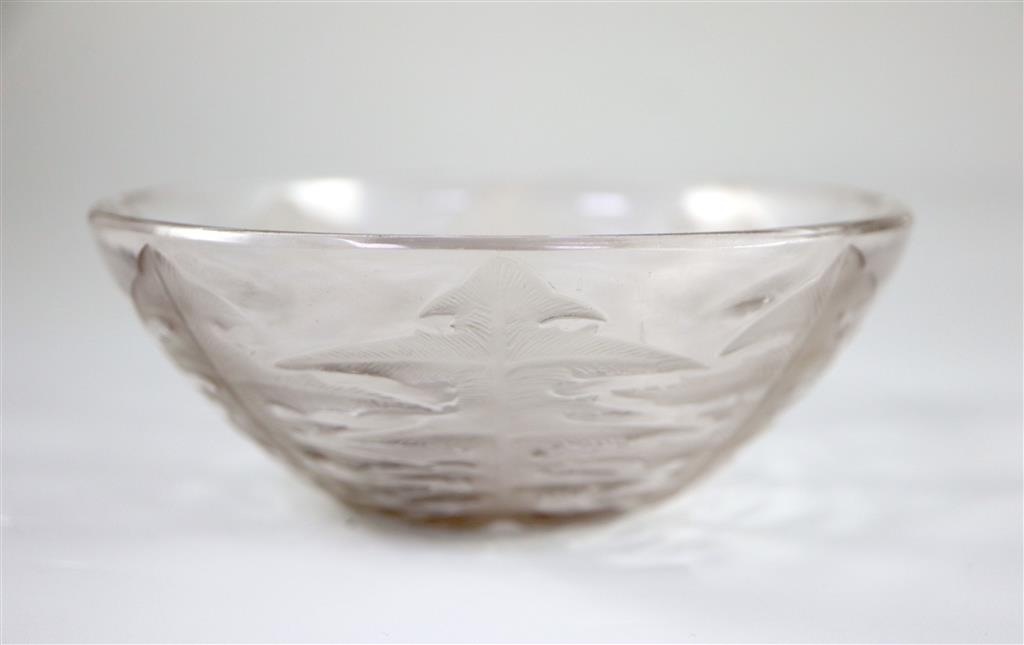 René Lalique. A pre-war Pissenlit No.1 pattern bowl, no.3215, designed in 1921 and a post war Lalique leaf pattern bowl, 13 and 14.5cm